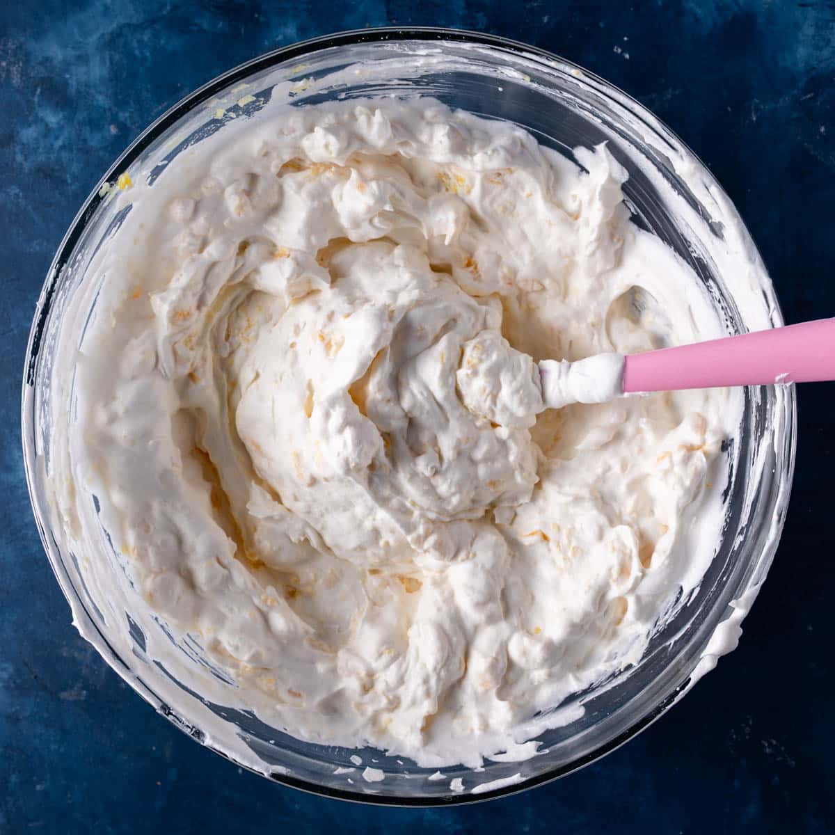 whipped cream and pineapple in a bowl