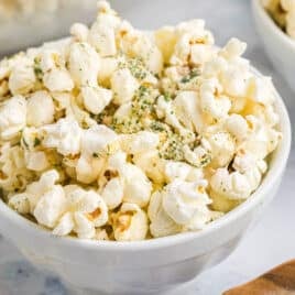 a bowl of ranch popcorn mix