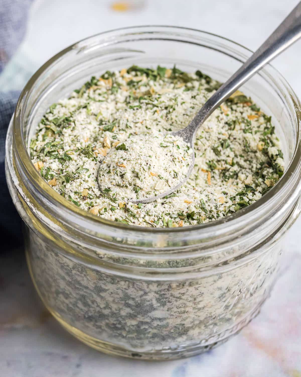 ranch seasoning in a jar with a spoon