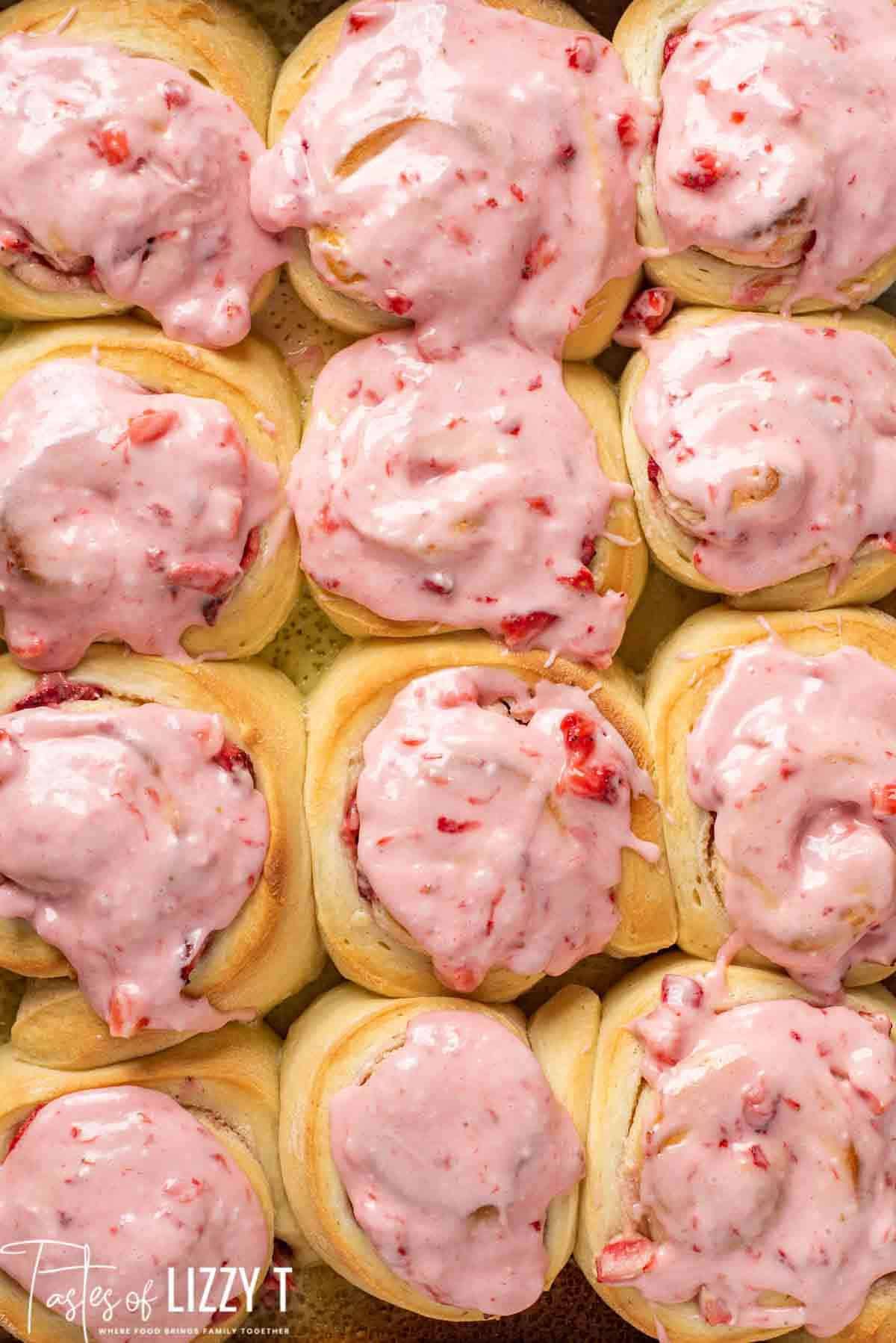 overhead view of strawberry rolls with glaze