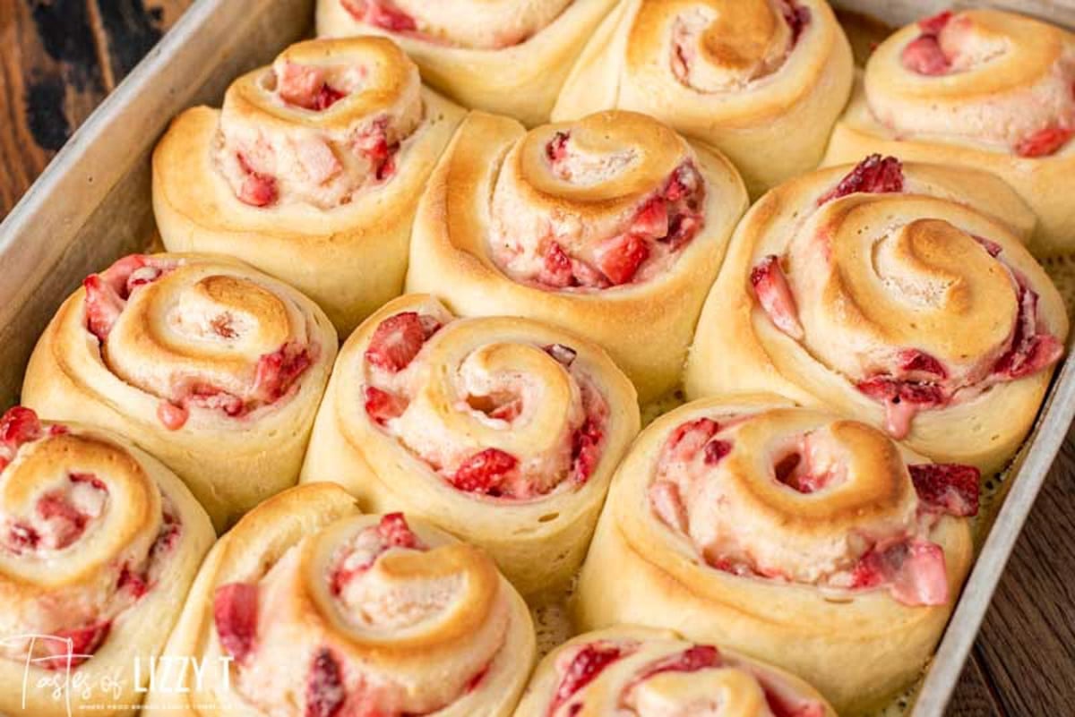 baked rolls with strawberries in a pan