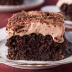 a piece of chocolate tres leches cake on a plate