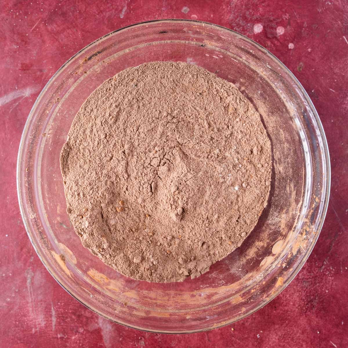 dry ingredients for chocolate cake in a bowl