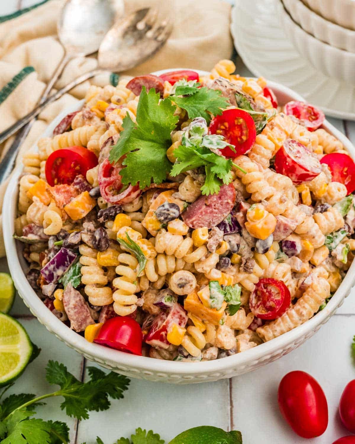 loaded cowboy pasta salad in a bowl with cilantro