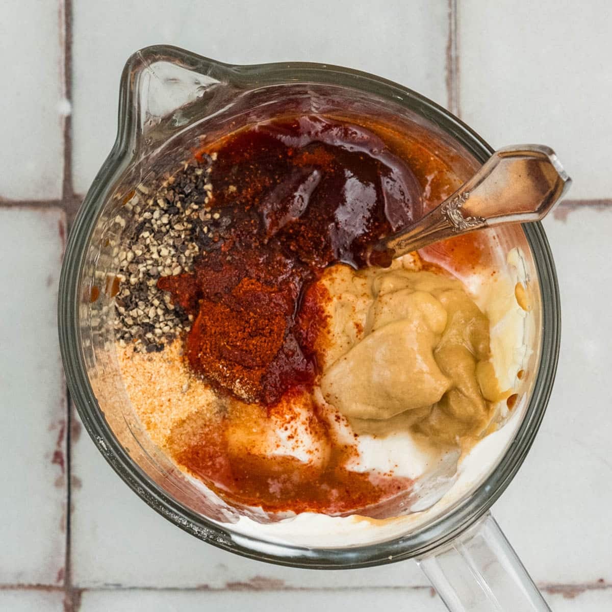 ingredients for cowboy dressing in a glass bowl