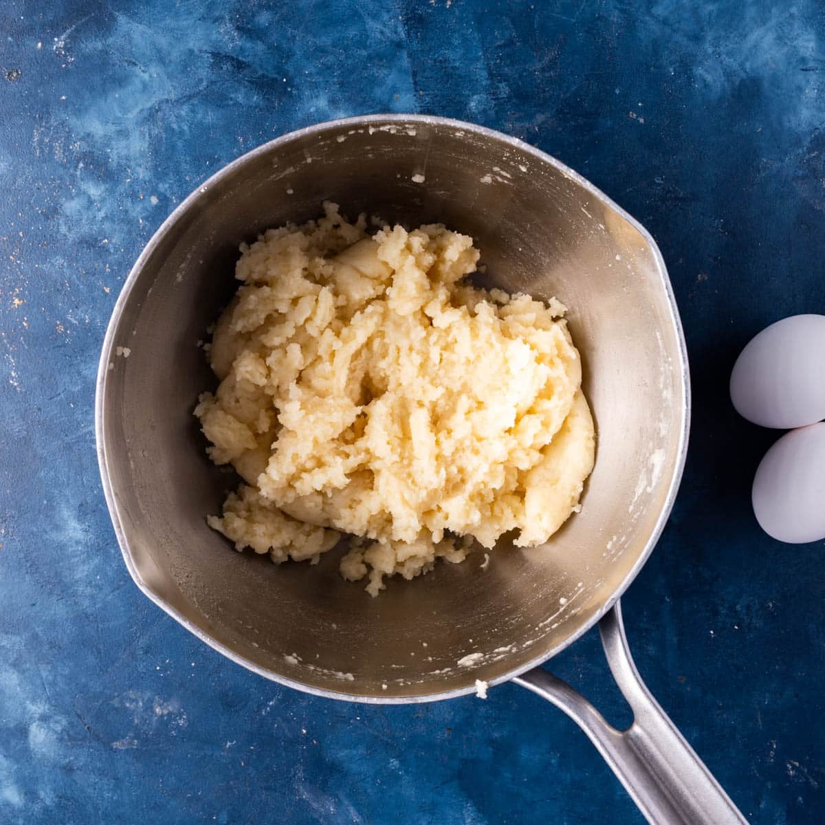 cruller dough base in a saucepan