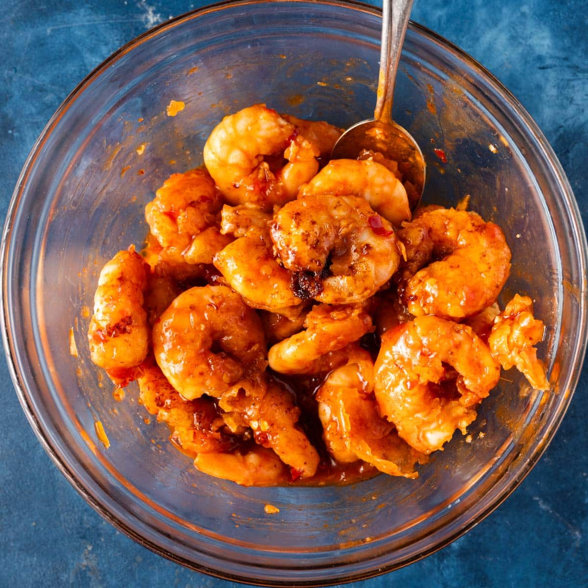 shrimp in a bowl with firecracker sauce
