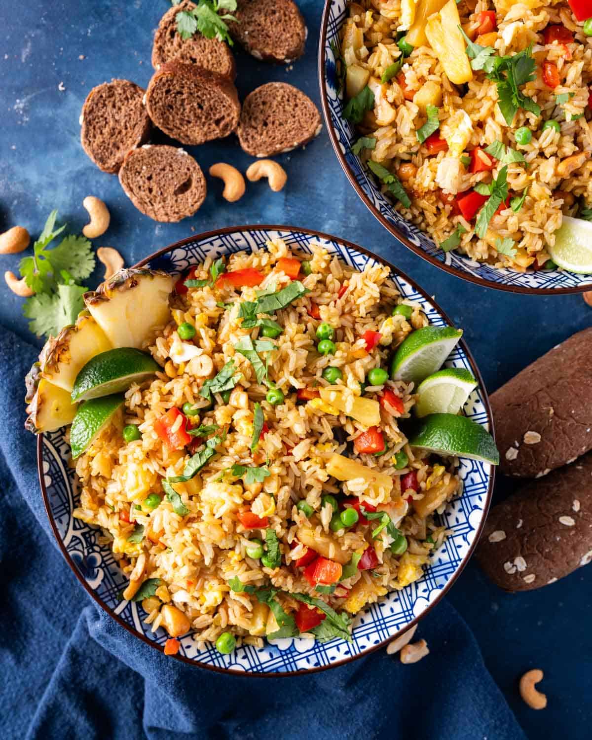 pineapple fried rice with cashews on a table