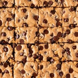 overhead view of cut chocolate chip sheet pan cookies