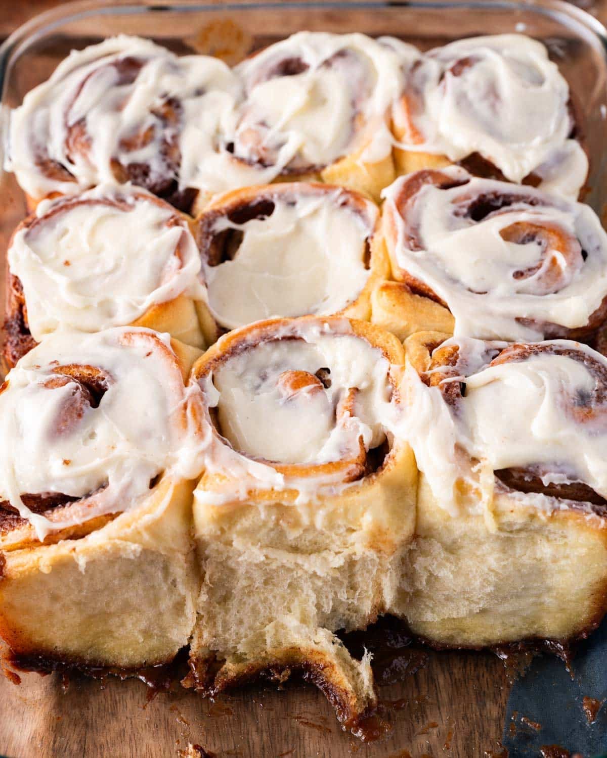 overhead view of sourdough discard cinnamon rolls in a pan
