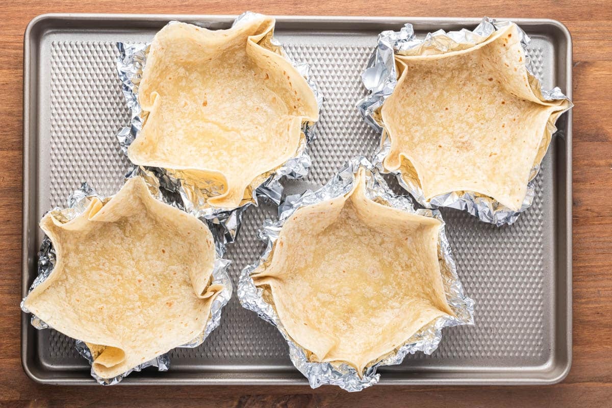 how to shape flour tortillas into baked taco bowls