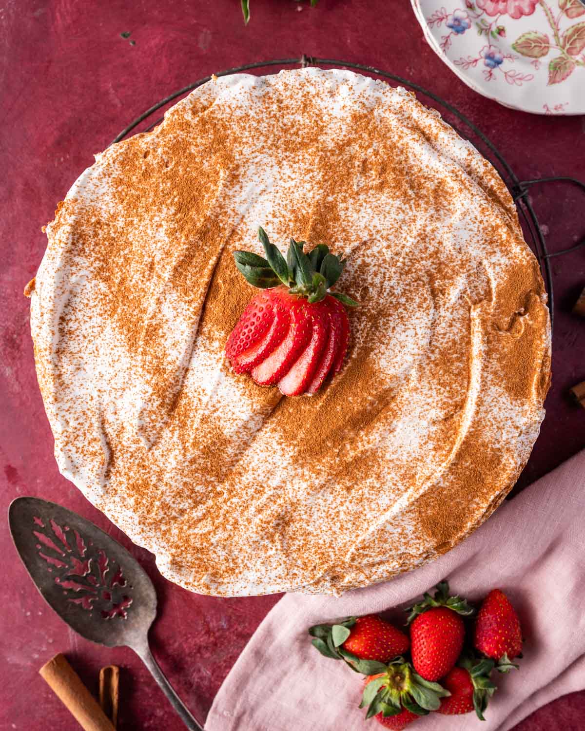 overhead view of a cinnamon dusted cake