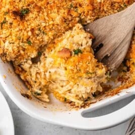 overhead view of chicken and hash brown casserole on a spatula