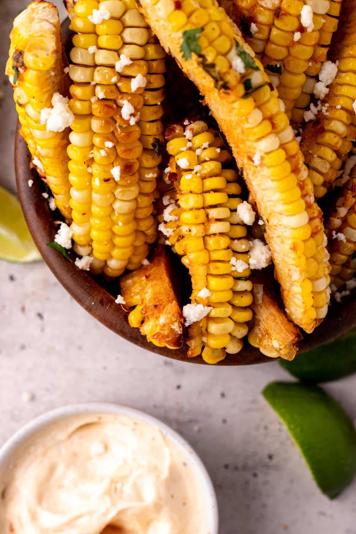 closeup of corn ribs with cotija cheese
