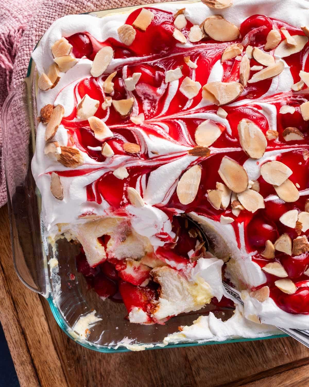 overhead view of heaven on earth cake in a pan with a spoon