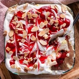 overhead view of heaven on earth cake in a pan with a spoon
