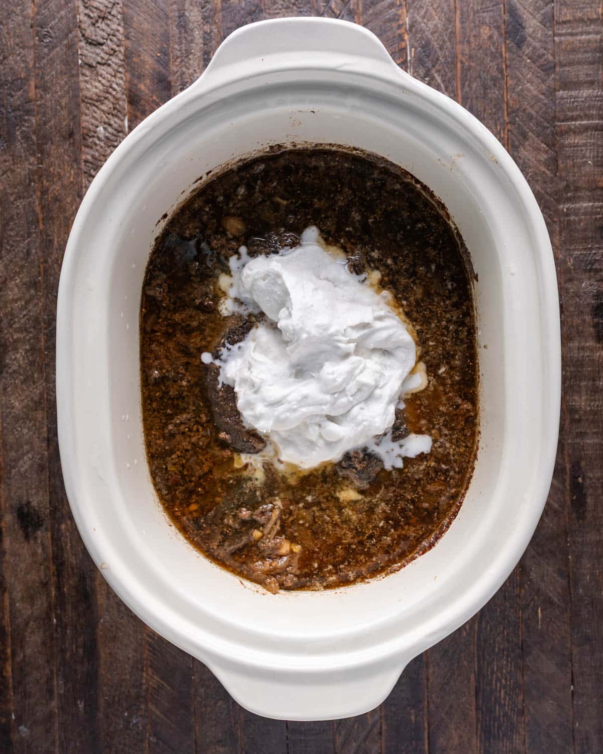 coconut milk over mushroom steak in a bowl