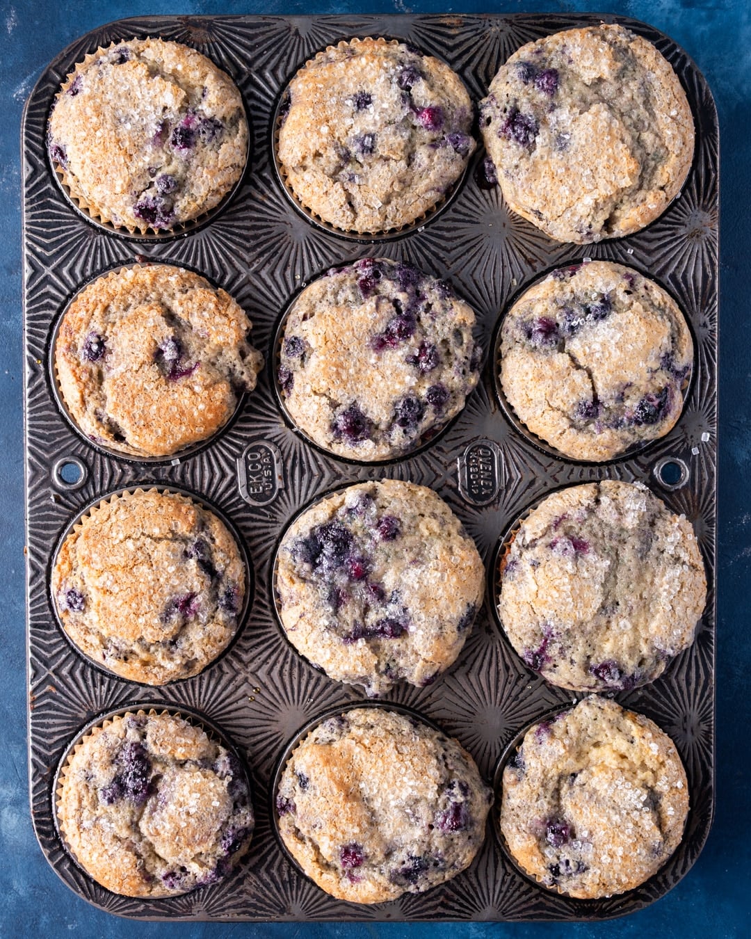 baked brown sugar blueberry muffins in a pan