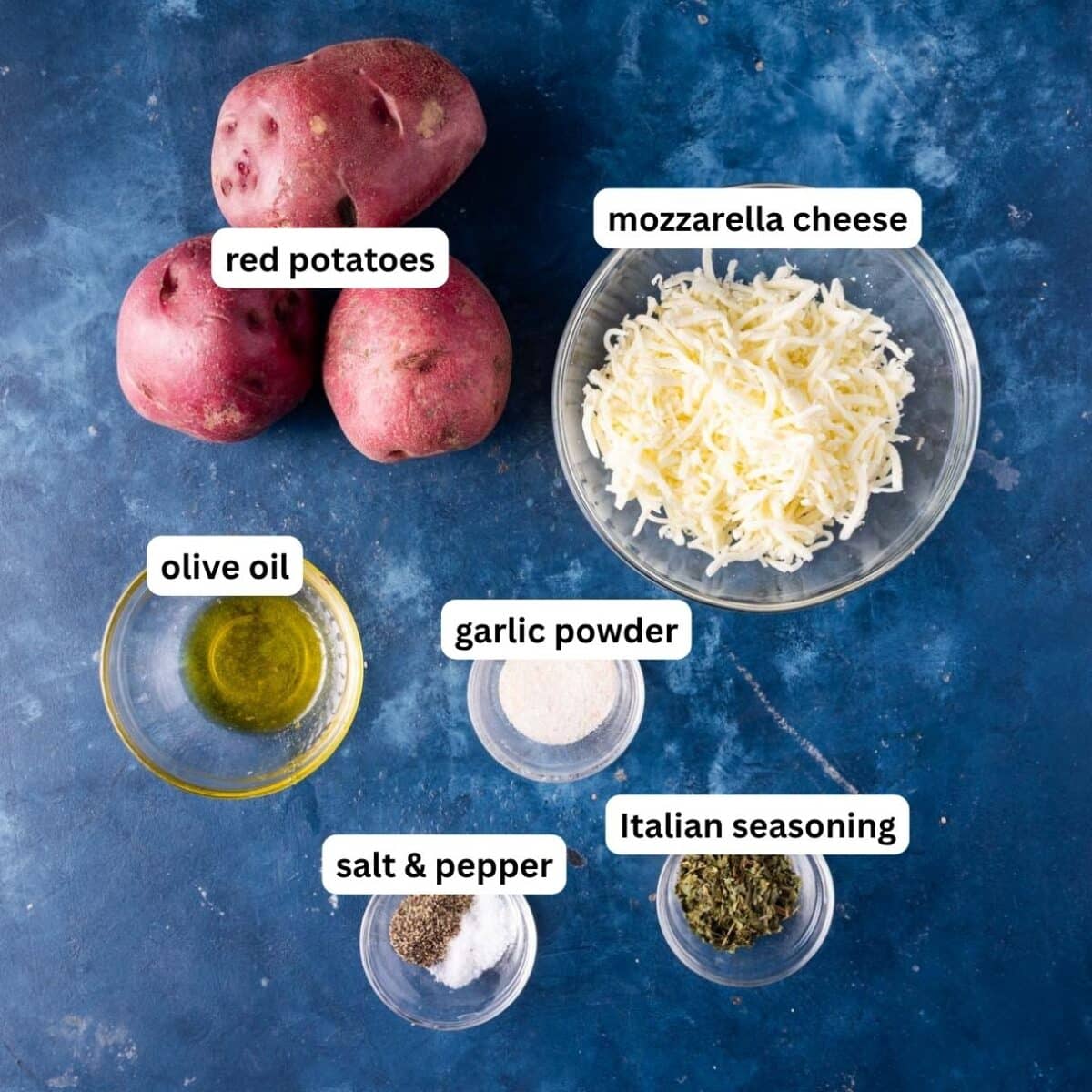 ingredients for cheesy potatoes on a table