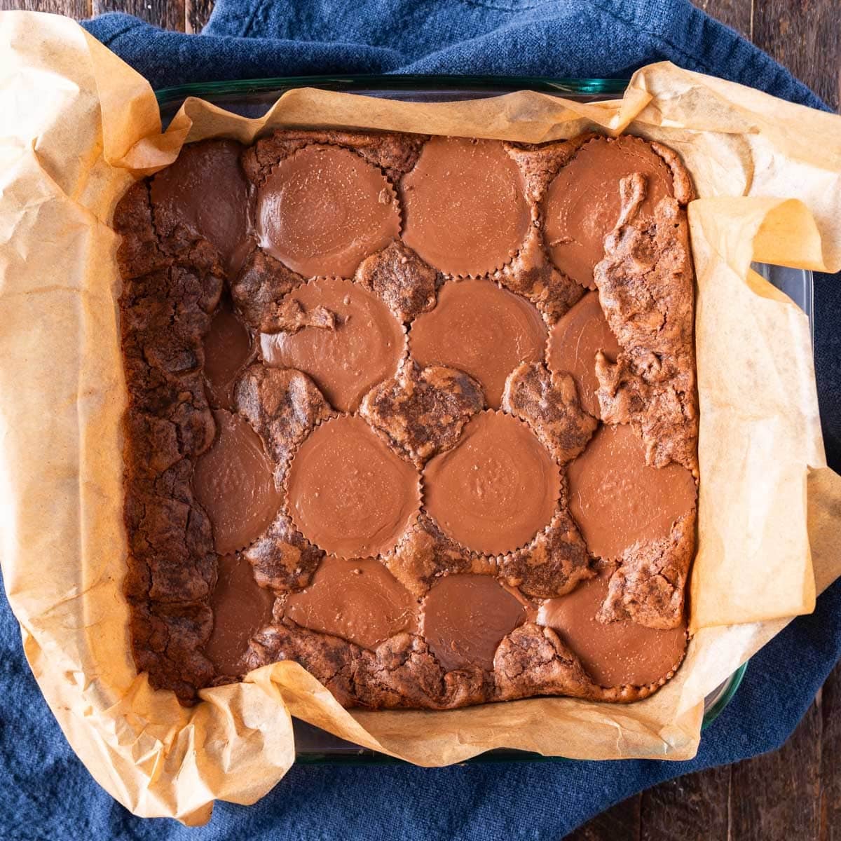 overhead view of baked brownies with reese's stuffed inside
