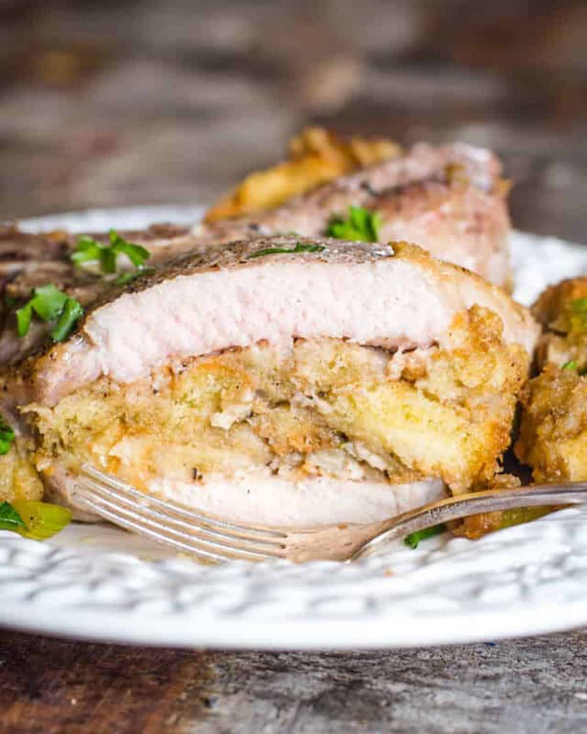 pork chops stuffed with stuffing on a plate