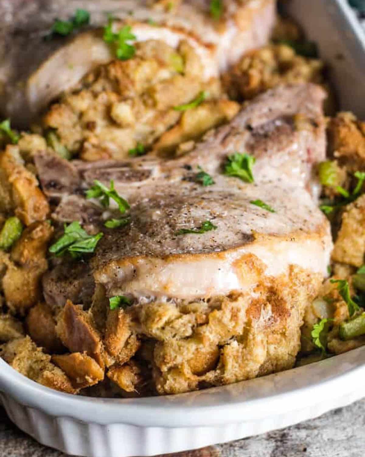 stuffed pork chops in a baking pan