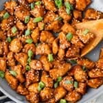 hoisin chicken in a skillet with a spatula