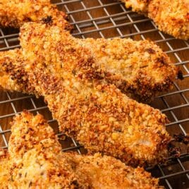 oven baked chicken tenders on a wire rack