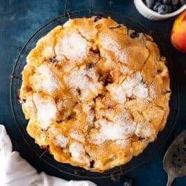 overhead view of peach blueberry cake