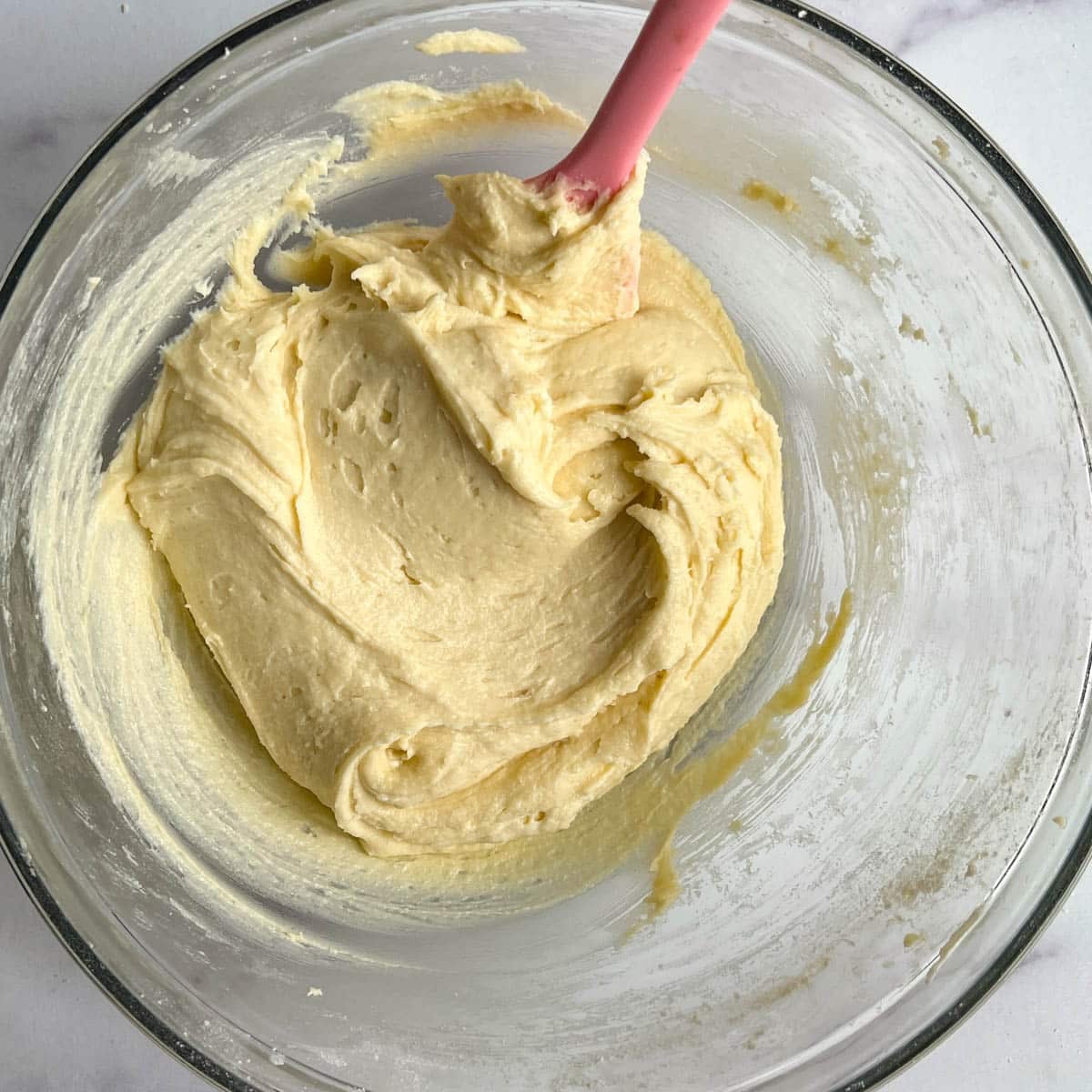 batter for a fruit cake in a bowl