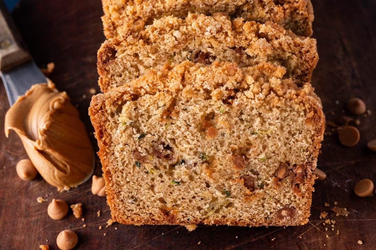 sliced peanut butter zucchini bread on a table