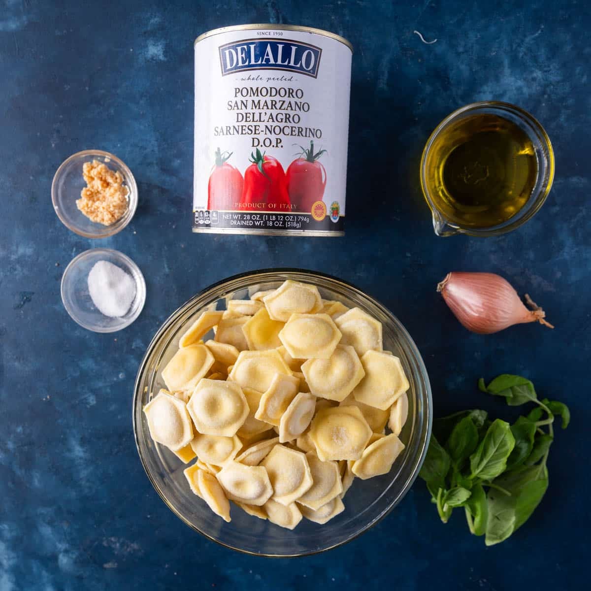 ingredients for ravioli al pomodoro on a table