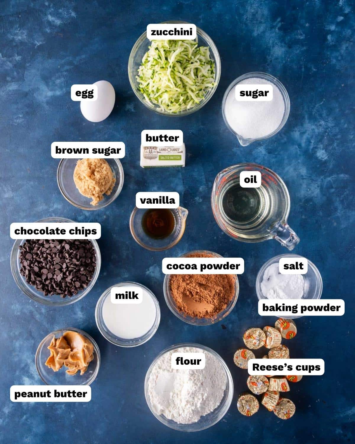 reese's zucchini muffins ingredients on a table