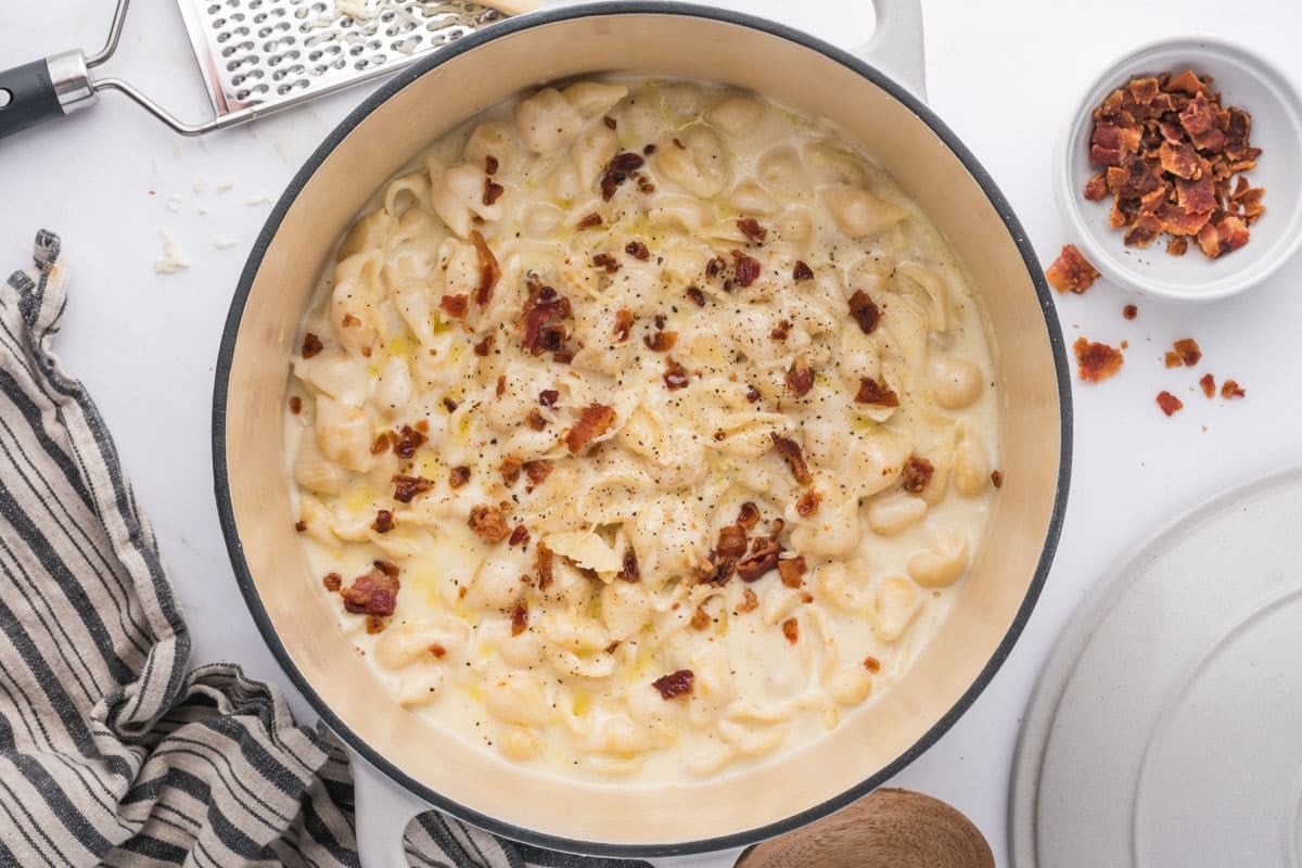 bacon and cracked pepper over white cheddar mac and cheese