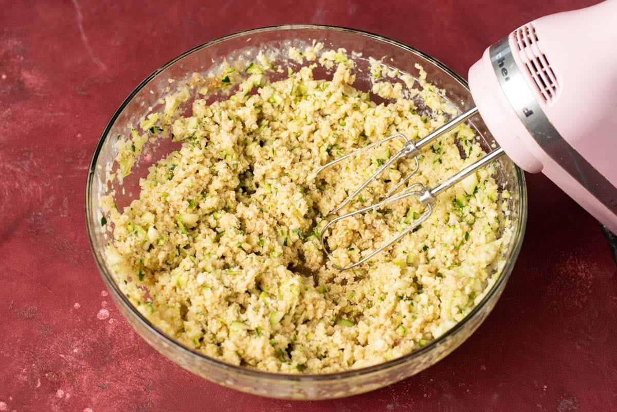 zucchini, butter and sugar in a mixing bowl