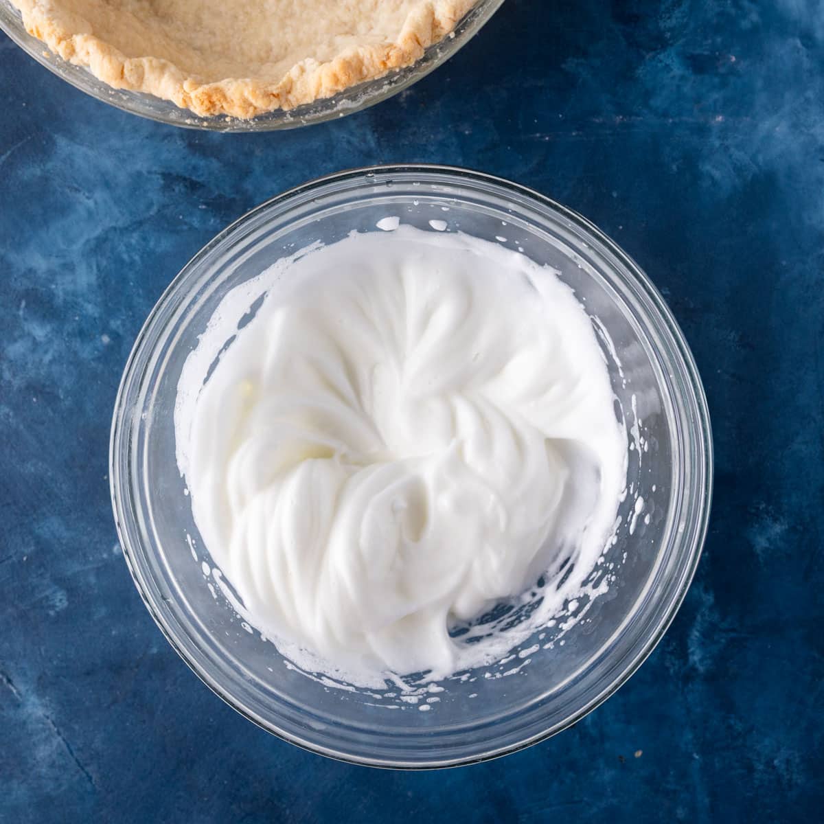 whipped egg whites in a bowl