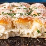 garlic bread hawaiian rolls with cheese in the middle