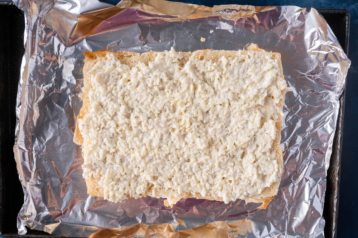 rolls with cheese mixture spread on top