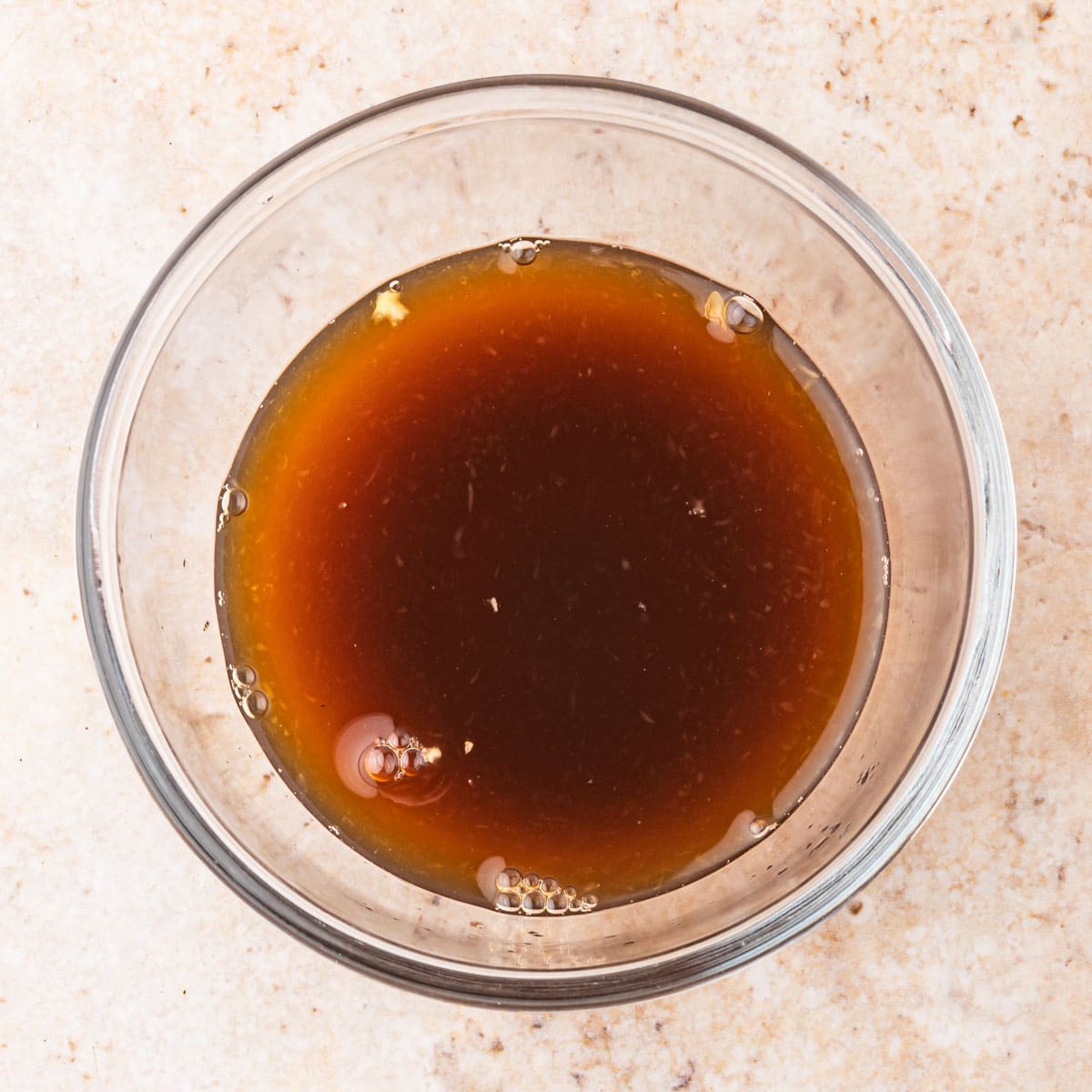 sauce for stir fry in a glass bowl