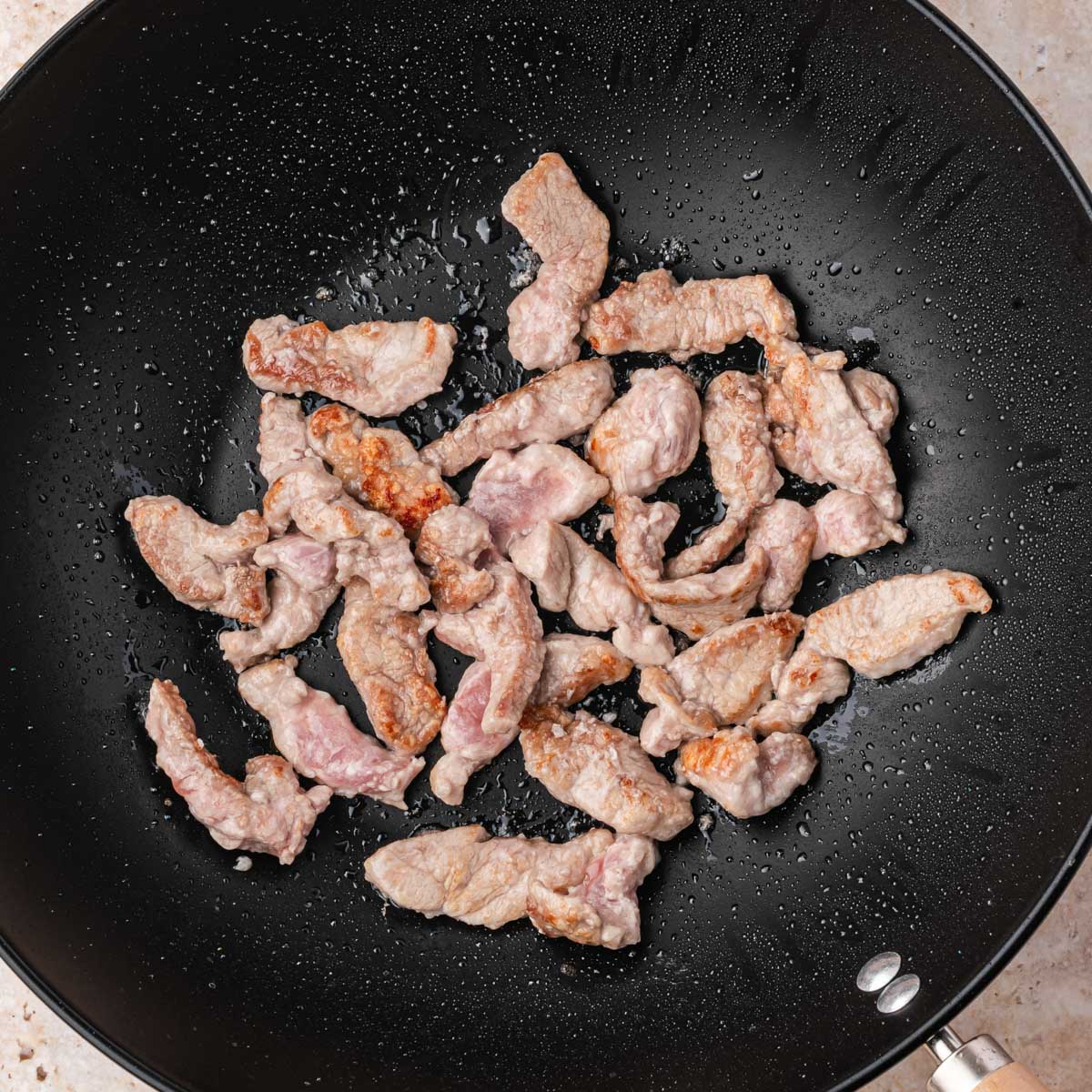 seared pork tenderloin in a skillet