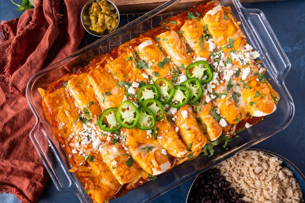 a pan of enchiladas with pulled pork