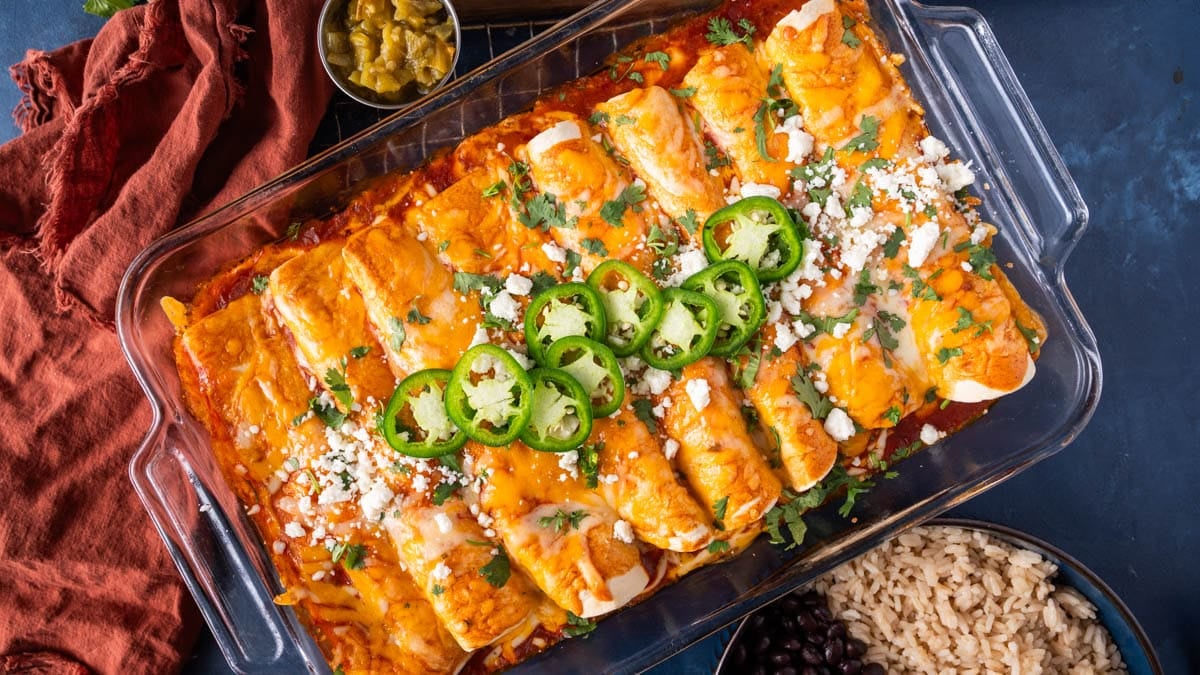 a pan of pulled pork enchiladas