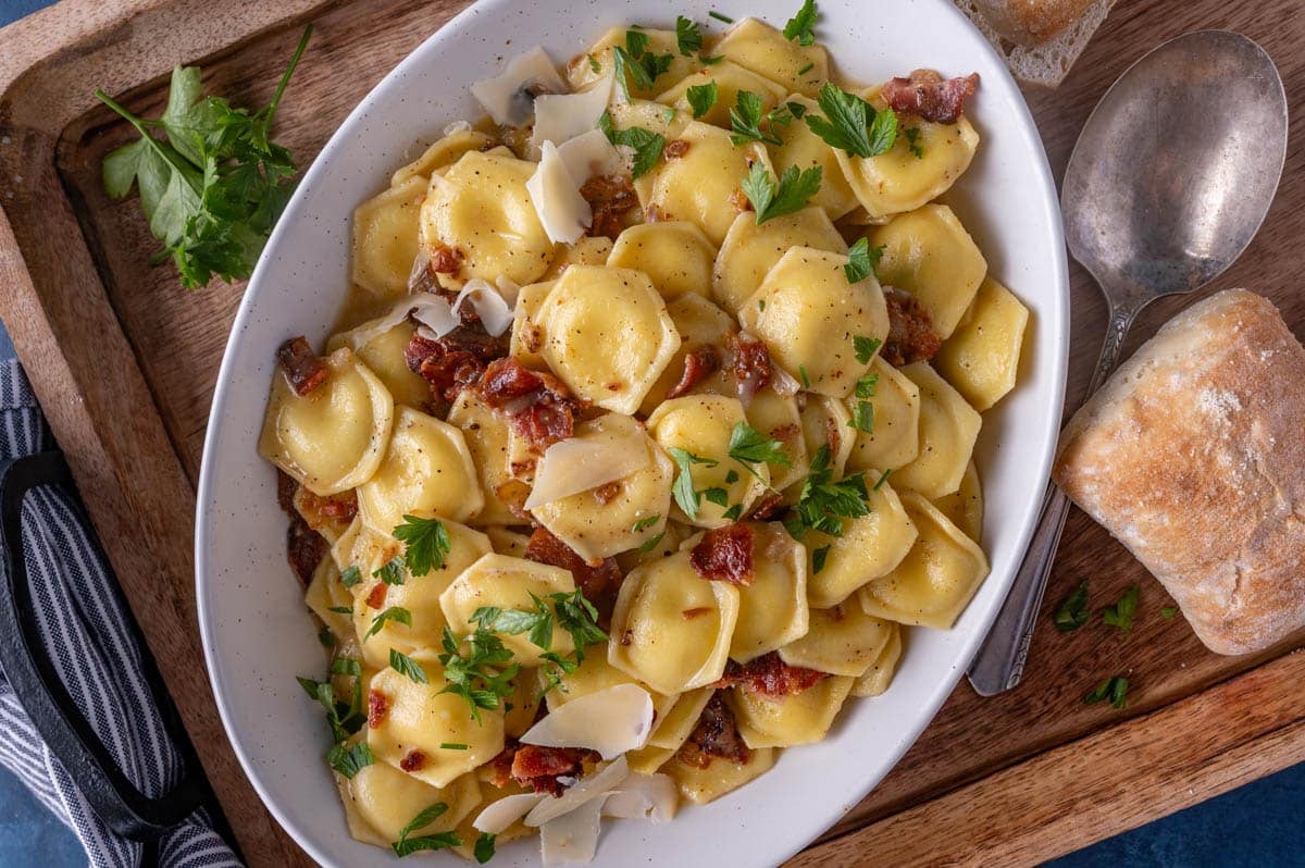 carbonara with ravioli on a plate