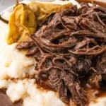 closeup of mississippi pot roast on potatoes