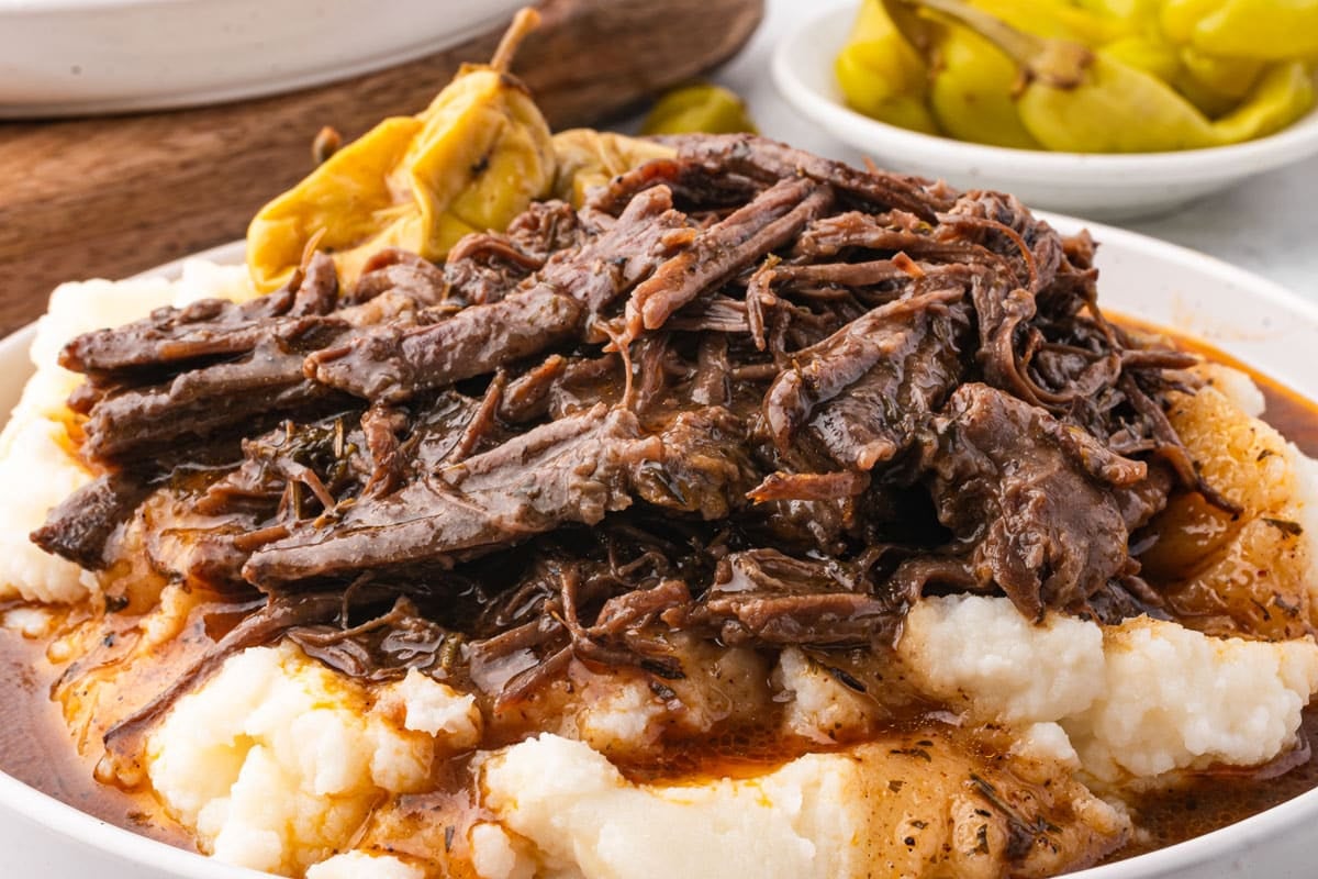 mississippi pot roast over a bed of mashed potatoes