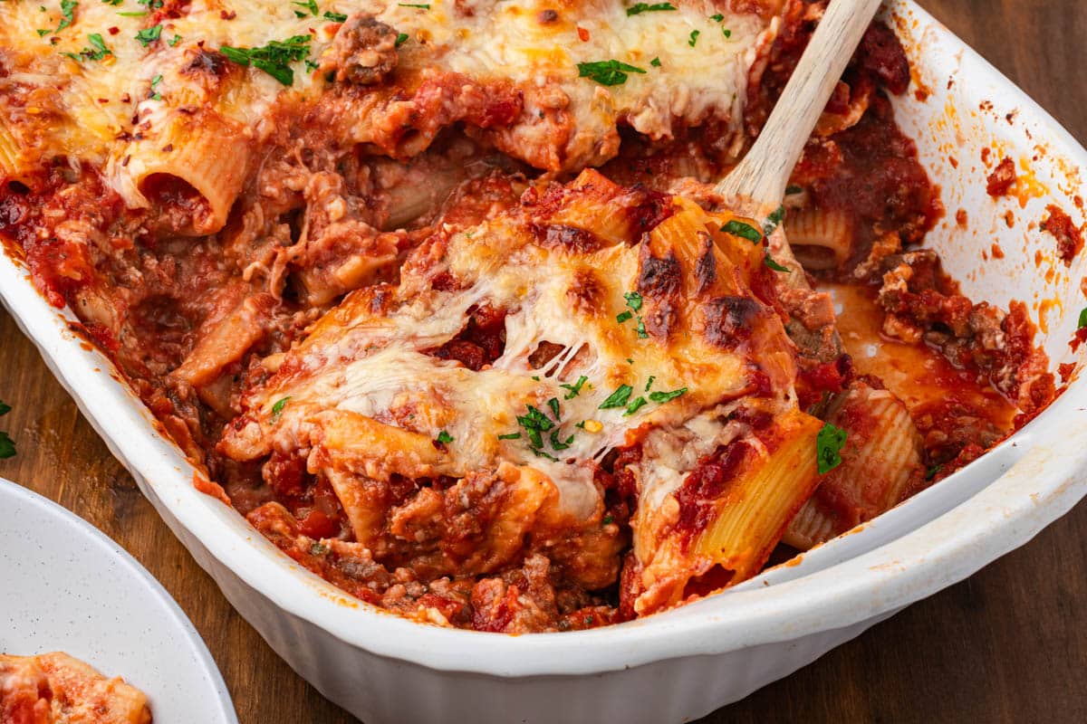 rigatoni with ricotta and sausage in a baking pan