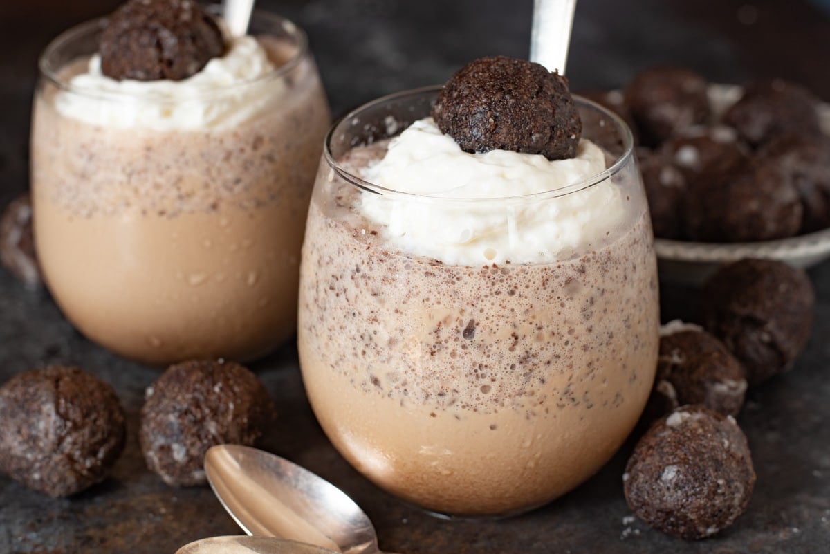 two cups of mocha iced coffee on a table