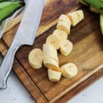 sliced plantains on a cutting board