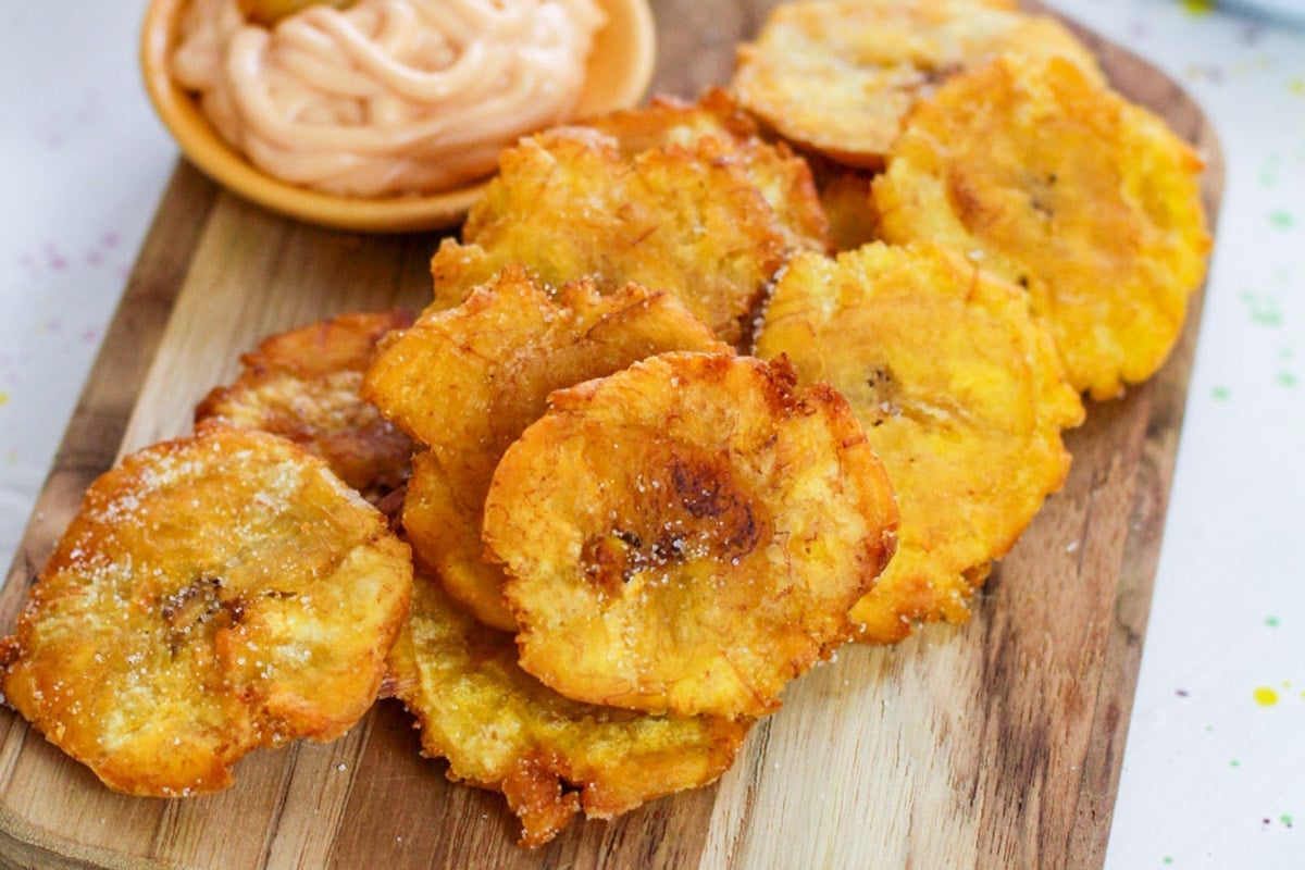 fried plantains on a cutting board