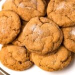 closeup of sugar topped soft molasses cookies on a plate